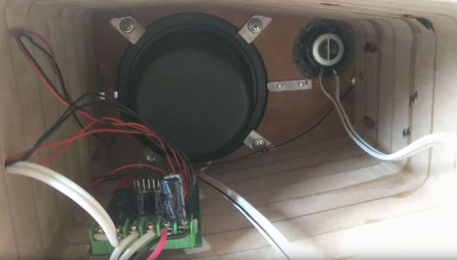 Amplifier and speakers inside the right chamber.