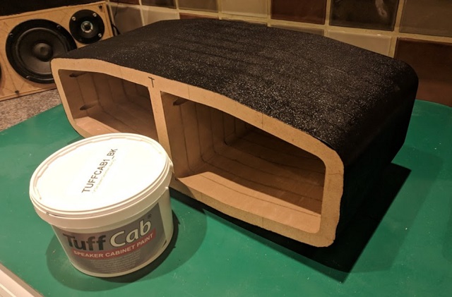 Planing and sanding the cabinet.